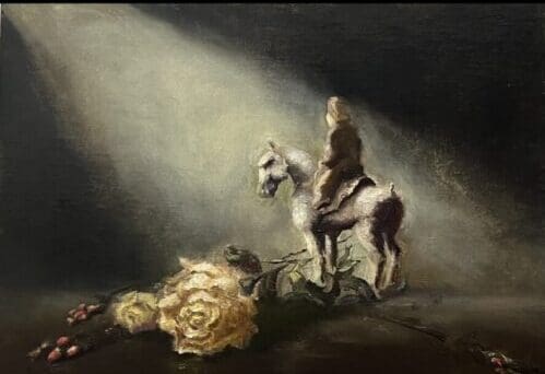 Rider on horse beside yellow rose, spotlight.